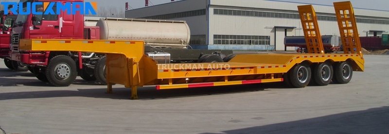 Trailer lowboy de viga côncava com um poço profundamente recuado para carga extra alta