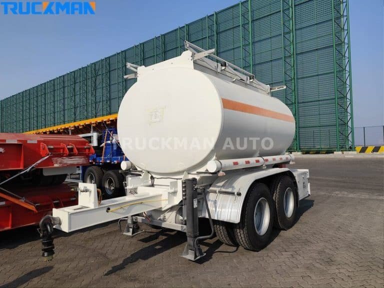 TRUCKMAN AUTO fuel tanker trailer with white and orange stripes, ready for transport of hazardous materials