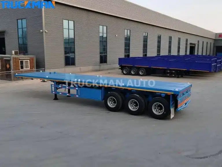 Blue flatbed container semi-trailer ready for loading at the transport logistics center