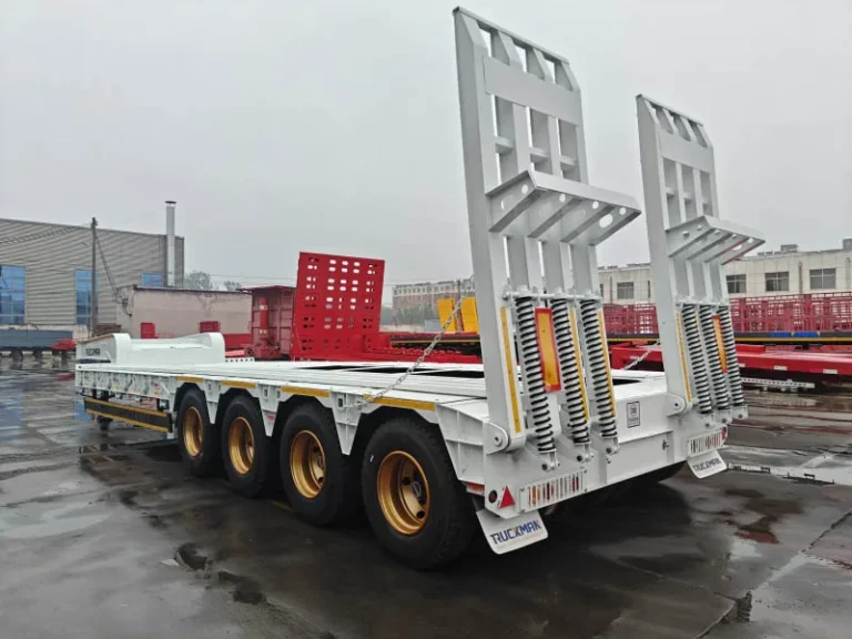 Four axle lines with 32 tires on a 100 ton lowbed semi trailer