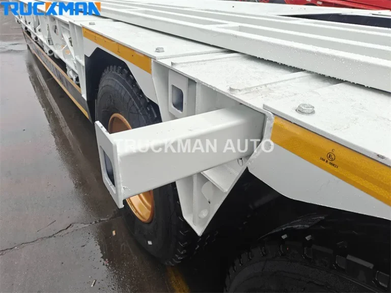 Pull-out side widener extending the lowbed trailer deck for over-width cargo